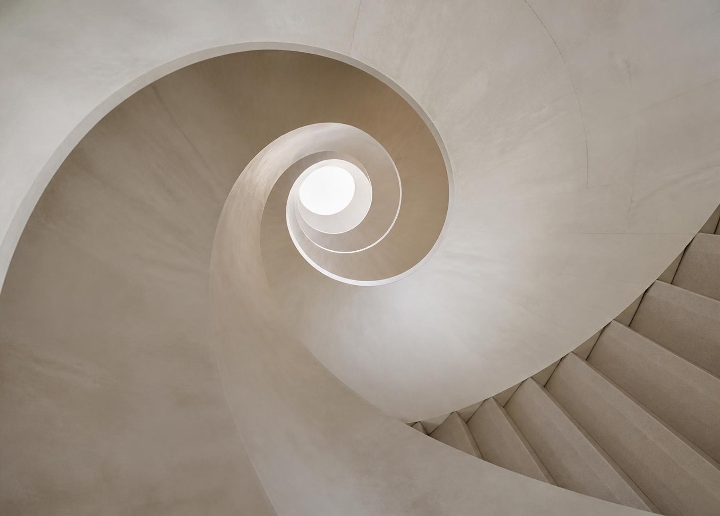 A spiral staircase seen from below